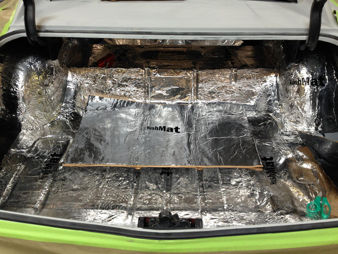 Hushmat Custom Vehicle Sound Deadening and Thermal Insulation Cargo Kit treats the floor and rear quarter panels.